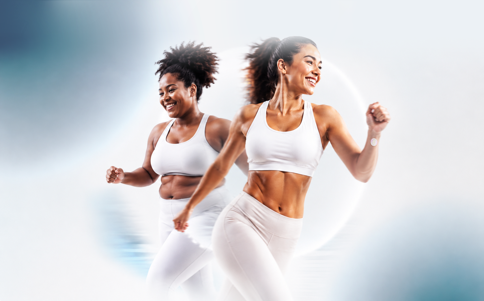 Two active women in a bright white wellness studio